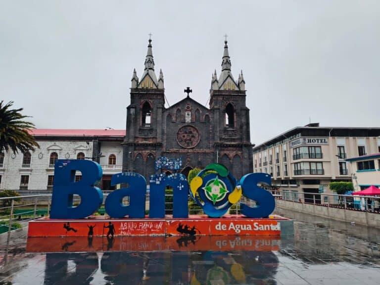 Baños de Agua Santa sign before church