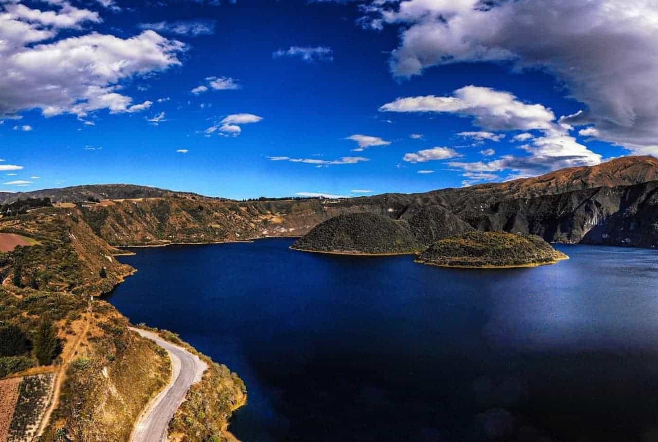 Crater lake with islands and mountain landscape